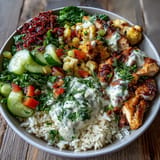 Flavorful Middle Eastern Shawarma Bowl featuring tender chicken, fluffy rice, and creamy tahini.