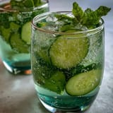 Sparkling Cucumber Mint Lemonade Mocktail with fresh mint and lemon, ready to chill.