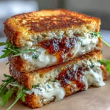 Warm, crusty sourdough grilled cheese filled with sweet fig jam and creamy goat cheese.