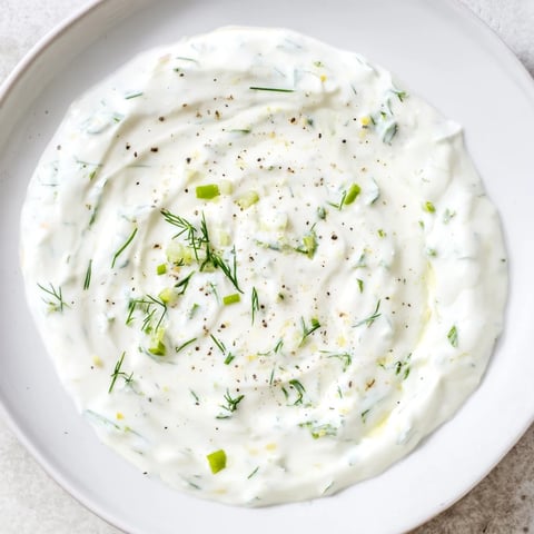 A vibrant and creamy Greek Yogurt Ranch Dip, perfect for dipping fresh vegetables or chips.