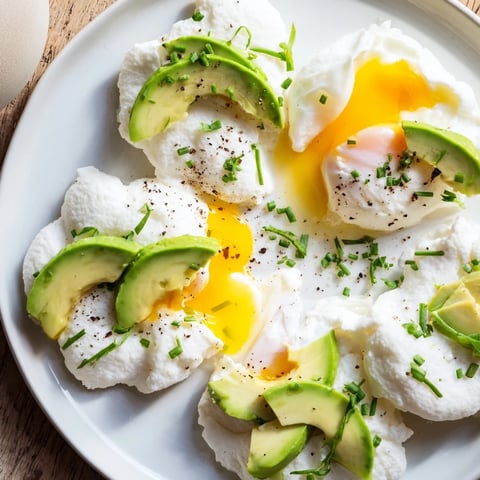Fluffy cloud bread breakfast clouds, golden-baked and topped with creamy avocado and perfectly poached eggs.