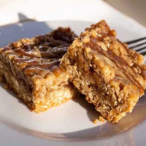 Warm, gooey Cinnamon Swirl Oatmeal Blondies, hints of cinnamon and buttery oats.